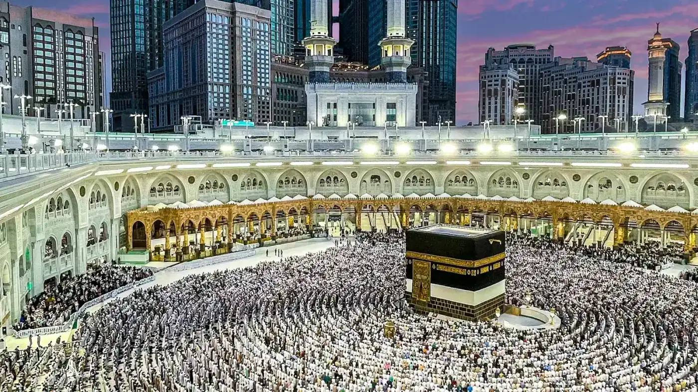 Aerial view of the Kaaba and Masjid Al-Haram in Makkah with worshippers